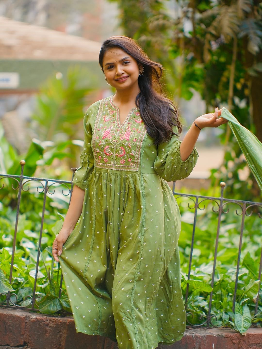 Olive green embroidered suit set worn by Apurva Gore Olive green embroidered suit set worn by Apurva Gore